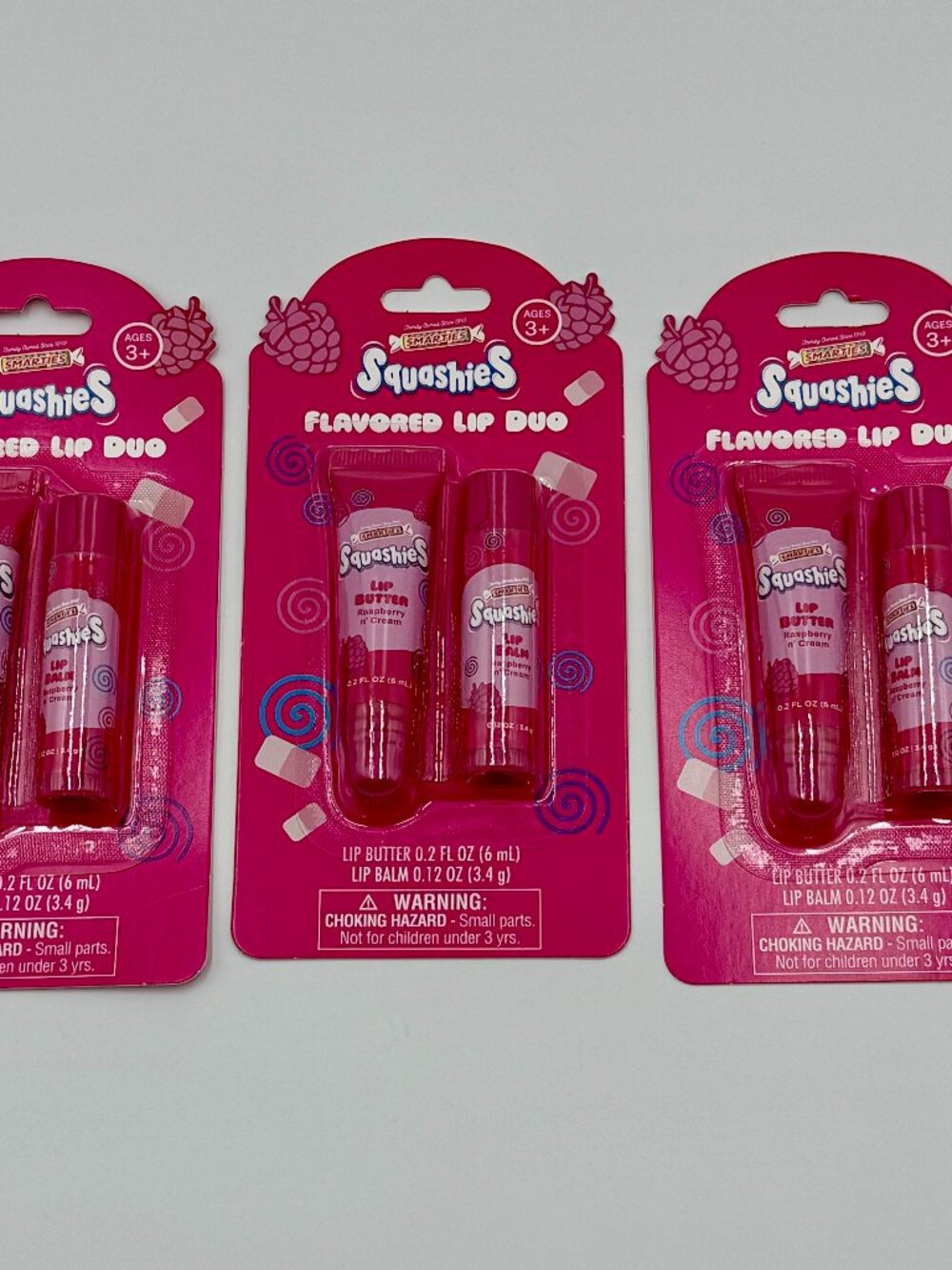 6 Smarties Raspberry N' Cream Flavored Lip Balms & Glosses